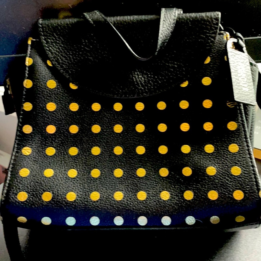 Black and gold Kate Spade Saturday crossbody bag